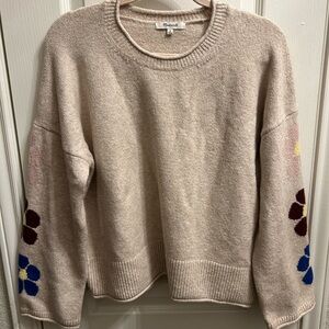 Madewell sweater with flower detail on arms